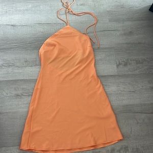 Isabelle’s cabinet orange silk dress